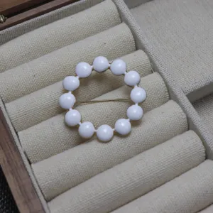 Elegant white bead circle brooch scarf buckle pin, minimalist design for women fashion daily wear.