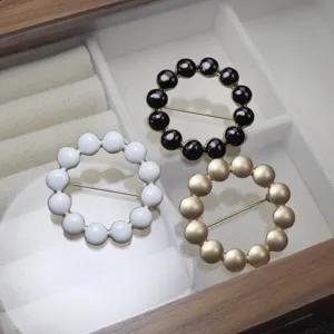 Elegantly designed round bead brooch scarf buckle set featuring three stylish colors.