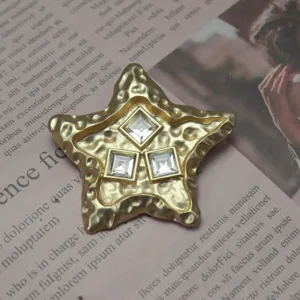 Vintage molten five-pointed star rhinestone brooch, exquisite textured metal accessory.