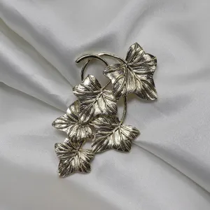Vintage gold-tone grape leaf brooch pin, elegant botanical clothing accessory gift for women.