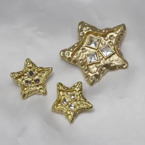 Vintage lava star rhinestone brooch and earrings set, textured gold jewelry accessories.