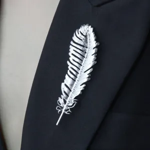 Elegant silver feather brooch lapel pin for women stylish suit dress fashion accessory.
