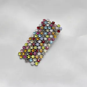 Multicolor rhinestone hair clip detail, dazzling crystal hair accessory for elegant styling.