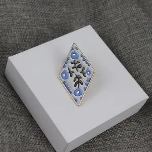 Diamond enamel brooch detail, elegant floral pattern, gold trim metal badge, fine craftsmanship, refined accessory for clothing lapel.
