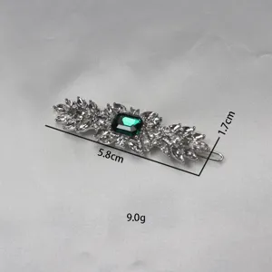 Vintage silver hair clip with emerald green crystal and clear rhinestones. Size 5.8cm.
