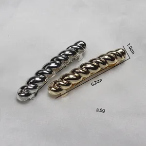 Metallic twisted hair clip set, elegant gold and silver spring clips for women daily hair styling.