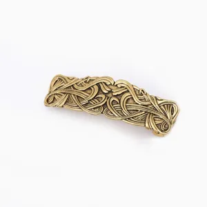 Vintage brass metal hair clip for women, exquisite carved automatic barrette for elegant style.