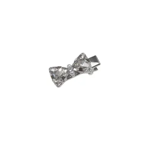 Silver rhinestone bow hair clip with pearls, elegant duckbill clip accessory for women.