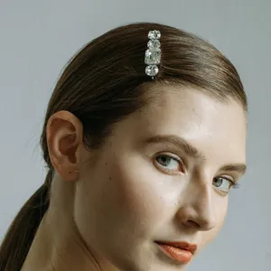 Crystal rhinestone bobby pin detail shot, elegant bridal hair accessory for women and girls.