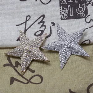 Vintage rhinestone star brooch pins set, exquisite crystal lapel pins for suits and bags.