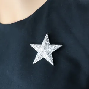 Silver crystal rhinestone star brooch pin for elegant suit, hat and bag apparel decoration.