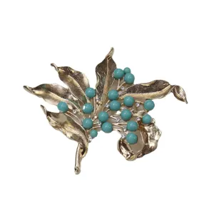 Vintage gold-tone leaf turquoise bead brooch pin, elegant statement jewelry for women's clothing.