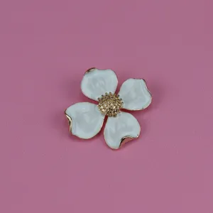 Vintage enamel flower brooch, elegant white metal jewelry accessory for women, detail shot.