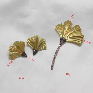 Vintage style rhinestone ginkgo leaf matte gold brooch and earrings jewelry set for women.