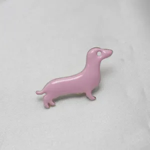 Pink enamel dachshund dog brooch pin for clothing, hats and bags accessory details.