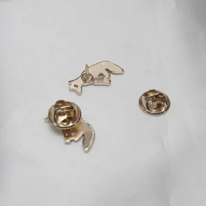 Detailed view of cute fox enamel lapel pin back clasp metal accessories for clothing and bags.