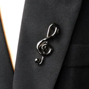 Elegant black music note treble clef brooch pin for apparel accessories and suit lapel.