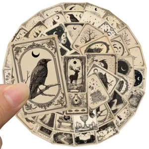 Gothic tarot stickers detail showing vintage crow moon illustration and decorative mystical borders.