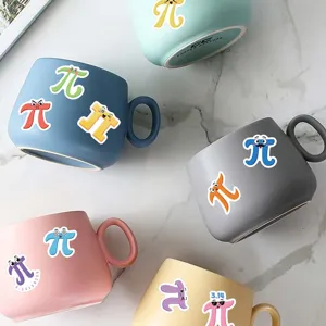 Detailed shot of cute cartoon Pi symbol ceramic mugs in various pastel colors on marble.
