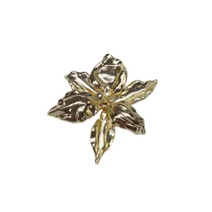Minimalist gold metallic 3D iris flower brooch pendant, elegant chic accessory for women.