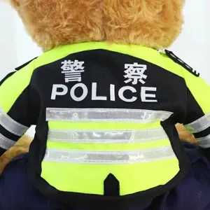 Detailed view of the police teddy bear plush toy wearing high visibility reflective vest.