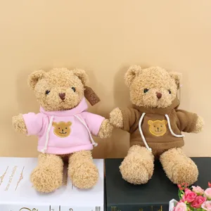 Cute plush teddy bear toy with stylish hooded sweatshirt, soft stuffed animal gift for kids.