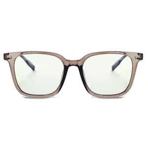 Oversized clear blue light blocking glasses frame detail, transparent grey stylish optical eyewear.