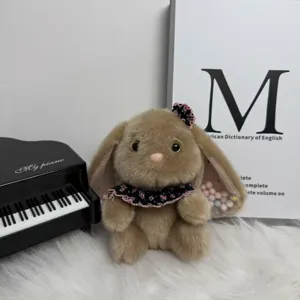 Cute brown long ear bunny plush toy pendant, soft stuffed animal doll keychain for bag decor.