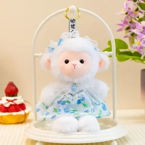 Cute sheep plush toy with blue cherry dress and lace headband, hanging detail display.