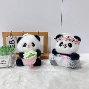 Cute panda plush toy pendant keychain featuring a bouquet and floral dress design for gifts.