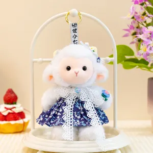 Cute plush lamb doll pendant with blue floral dress, soft stuffed sheep toy for kids and decor.