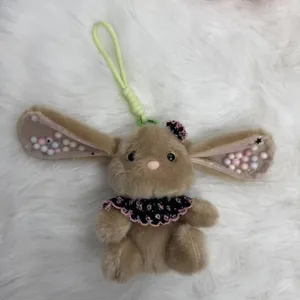 Cute brown long-eared rabbit plush keyring bag charm with cute collar and colorful balls ears.