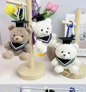 Cute graduation plush bear keychain, ideal school graduation gift and soft toy pendant.