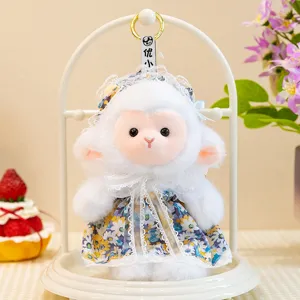 Cute plush sheep doll with lace dress and bonnet, soft fluffy stuffed animal toy for kids.