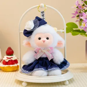 Cute plush sheep doll toy with blue dress and flower hat for children and cute room decor gifts.