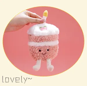 Cute plush cake pendant with candle and peach design, soft hanging doll keychain for gifts.