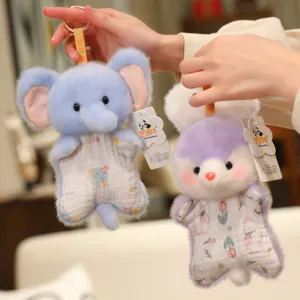 Cute plush animal pendant detailed view featuring adorable blue elephant and purple rabbit designs.