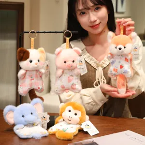 Detailed view of cute plush animal keychain pendant, soft fabric, lovely decoration.