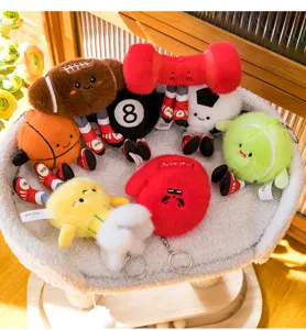 Cute sports plush toy keychains set, featuring basketball, football, tennis, and dumbbell designs.