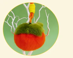 Plated plush persimmon bag charm, cute fluffy fruit key ring accessory for stylish daily wear.