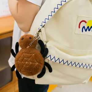 Cute fluffy spider plush keychain for backpack, soft brown insect stuffed animal bag charm pendant.