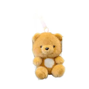 Mignon porte-clés en peluche ours marron avec fourrure douce et tache blanche sur le ventre.
