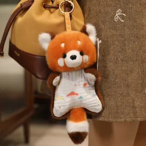 Cute red panda plush toy pendant for bags, soft stuffed animal doll keychain for kids.