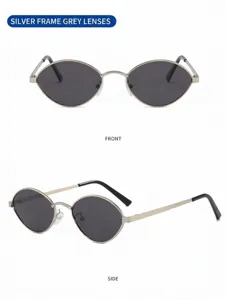 Detail shot of vintage oval metal sunglasses with grey lenses, stylish and retro design.