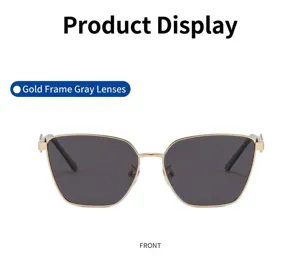 Detailed front view of premium gold metal frame sunglasses featuring stylish grey lenses.