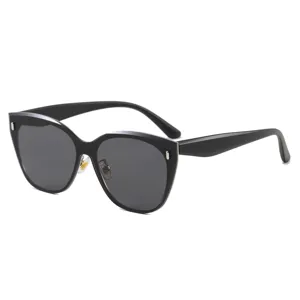 Schwarze Cat-Eye-Sonnenbrille für Damen und Herren, stylischer Oversize-Rahmen mit UV-Schutz.