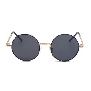 Round metal frame sunglasses detail view, classic vintage design with black lenses for kids.