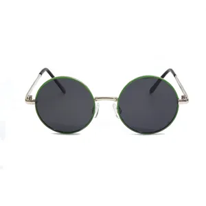 Detailed close-up of round metal children sunglasses with green frames and dark polarized lenses.