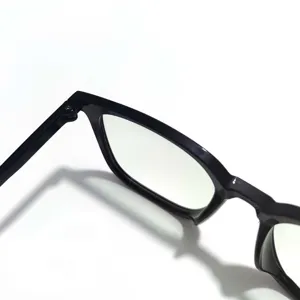 Close-up detail of stylish black frame anti-blue light flat glasses, lightweight design.