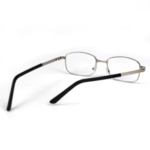 Detail shot of metal reading glasses with clear lenses and black temples for daily clear vision.